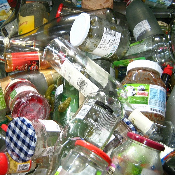 glass bottles and jars in recycling bin