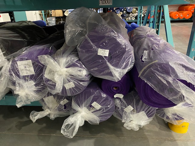 Purple Fabric packed in plastic bags