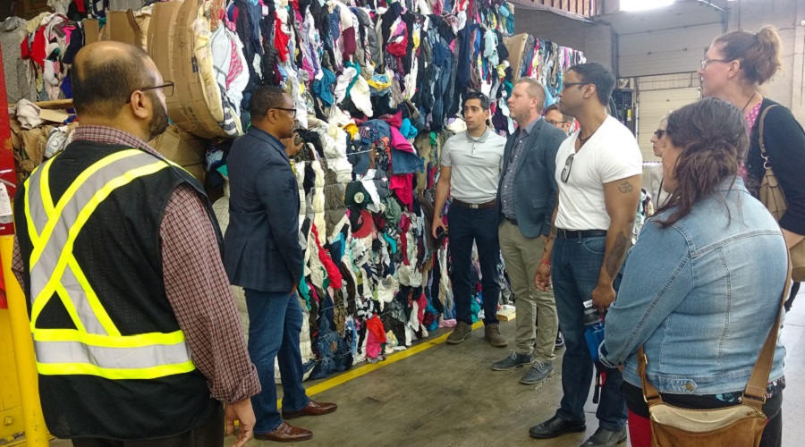 PPG waste management tour at a textile recycling facility