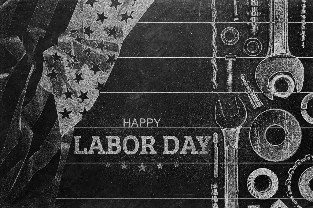 Black and white image with text saying "Happy Labour Day"